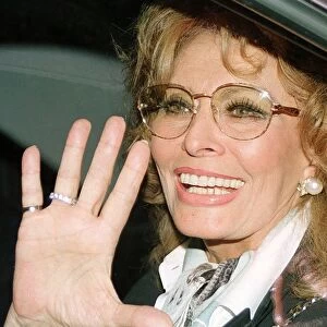 (FILES) -- This file picture shows Italian actress Sophia Loren waving to fans upon