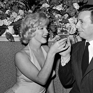 Marilyn Monroe and her co-star, French actor and singer Yves Montand