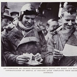 Air-Commodore Sir Charles Kingsford Smith (right) and Harry Ulm reading messages of congratulation on arrival at Croydon after completing their record flight from Australia (b / w photo)