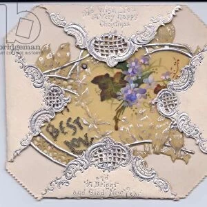 A Christmas card made of plastic with hand-painted violets, circa 1910 (plastic)
