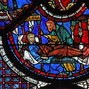 The Good Samaritan window: the Samaritan tends the wounded man (w44) (stained glass)