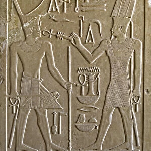 Hieroglyph depicting Senusret I who receives the symbols of life