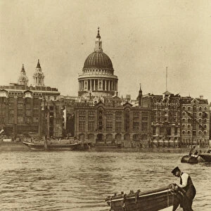 Thames waterman and his boat on the beach at Bankside (b / w photo)