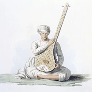 A Tumboora, musical instrument played by the higher castes
