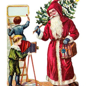 A Victorian Paper Scrap Relief of a boy taking a photograph of Father Christmas, c