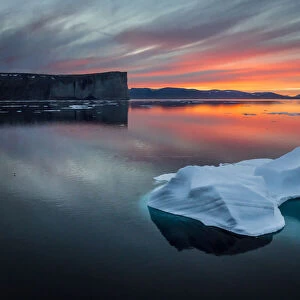 Sunset off Scott Island, with floating pieces of sea ice, Scott Inlet, Baffin Island, Canadian Arctic, August 2015
