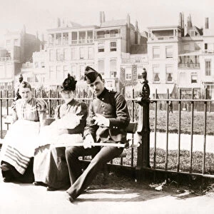 People on a bench, Rotterdam, 1898. Artist: James Batkin