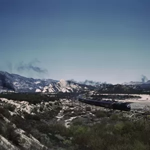 Santa Fe R. R. trains going through Cajon Pass in the San Bernardino Mountains, Cajon, Calif. 1943. Creator: Jack Delano
