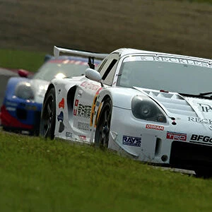 2003 Japanese GT Championship Sugo, Japan. 25th May 2003 GT300 - winner action. World Copyright: Shimpei Suzuki/LAT Photographic ref: Digital Image Only