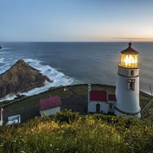 Heceta Head Lighthouse At Dusk; Oregon, United States Of America