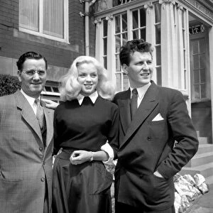 Actress Diana Dors with her husband Dennis Gittins (right) and Mr. J