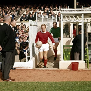 Bobby Charlton leads the Manchester United team out for a league division one match
