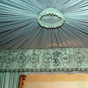 Emroidered drapes above the four - Poster bed where the Queen Mother was born in Glamis