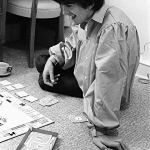 George plays Monopoly (with singer-songwriter Jackie de Shannon