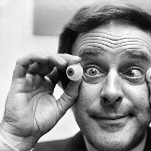 Two pairs of Irish eyes are smiling. The ones on the inside belong to Terry Wogan