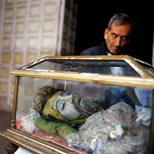 Companionship of Jesus Mission, Bolivia. Casket with a statue of Christ deposed from the Cross