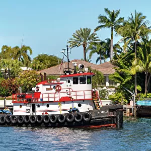 Florida, Boca Raton, tugboat cruising on the Intracoastal Waterway