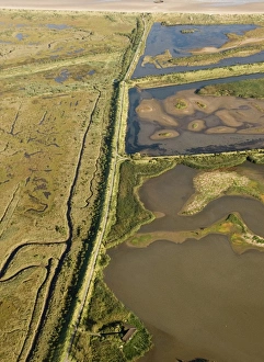 Aerial view of saltmarsh and lagoons at Titchwell RSPB Reserve North Norfolk autumn Aerial view of saltmarsh and lagoons at Titchwell RSPB Reserve North Norfolk autumn