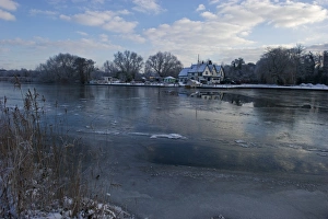 Frozen River Yare at Ferry Lane Wood near Postwick Norfolk December