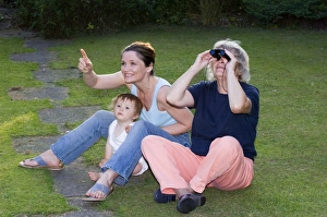 Birding Prints: Three generations birdwatching in garden Kent UK summer