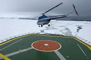 Images Dated 6th November 2006: Helicopter taking off with tourists from heli-deck of ice-breaker on route to Snow