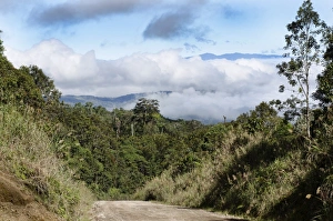 Highlands Highway running through rain forest at Tari Papua New Guinea Highlands Highway running through rain forest at Tari Papua New Guinea