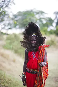 Kenya Prints: Kitkung Nampaso a Masai Warrior wearing Ostrich feather head dress as worn during
