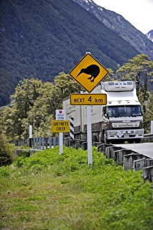 Kiwi caution sign on road to Arthurs Pass in Southern Alps South Island New Zealand Kiwi caution sign on road to Arthurs Pass in Southern Alps South Island New Zealand