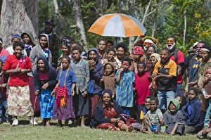Local crowd watching a Sing-sing Paiya Show Western Highlands Papua New Guinea Local crowd watching a Sing-sing Paiya Show Western Highlands Papua New Guinea