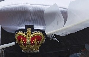 Mute Swans feather in The Queens Swan Marker David Barbers cap Swan Upping on River Mute Swans feather in The Queens Swan Marker David Barbers cap Swan Upping on River