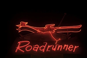 Neon Roadrunner sign outside restaurant in Socorro New Mexico USA