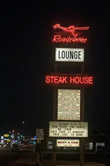 Neon Roadrunner sign outside restaurant in Socorro New Mexico USA