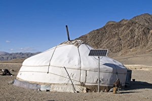 Nomads Ger with Golden Eagle and Solar Panel outside near Bayan-Uglii in Altai Mountains Nomads Ger with Golden Eagle and Solar Panel outside near Bayan-Uglii in Altai Mountains