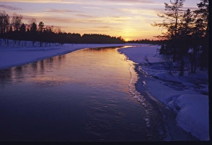 River near Rovaniemi in Finnish Lapland with sun setting winter Finnish Lapland River near Rovaniemi in Finnish Lapland with sun setting winter Finnish Lapland