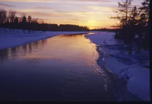 Landscape Prints: River near Rovaniemi in Finnish Lapland with sun setting winter Finnish Lapland