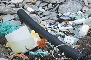 Shetland Prints: Rubbish washed up from sea on beach in Shetland