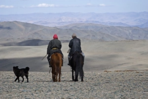 Shepherds on horseback in the Altai Mountains near Bayan-Uglii Mongolia September Shepherds on horseback in the Altai Mountains near Bayan-Uglii Mongolia September