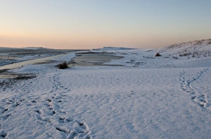Snow covered beach at Salthouse Norfolk December