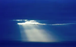 Shetland Prints: Sun poking through clouds at dusk over North Sea Shetland