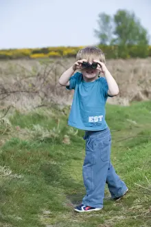 Birding Prints: Toddler (3 Yr old boy) bird watching on heath Norfolk April