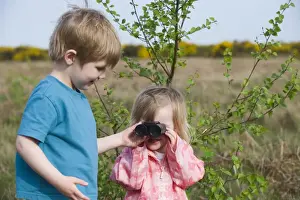Birding Prints: Toddlers (3 Yr old boy and 2yr old girl) bird watching on heath Norfolk April