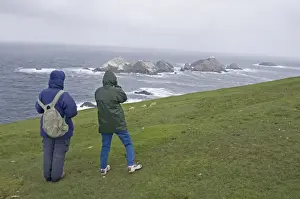 Shetland Prints: Walkers looking out on Britains most northerly point Muckle Flugga off Hermaness