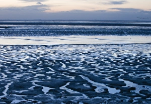 The mudflats of The Wash at Snettisham at low tide Norfolk winter
