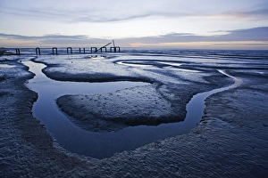 The mudflats of The Wash at Snettisham at low tide Norfolk winter